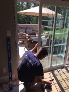 Tom Adams Installer fixing Patio Door