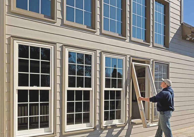 Man showing how to replace windows in a home.